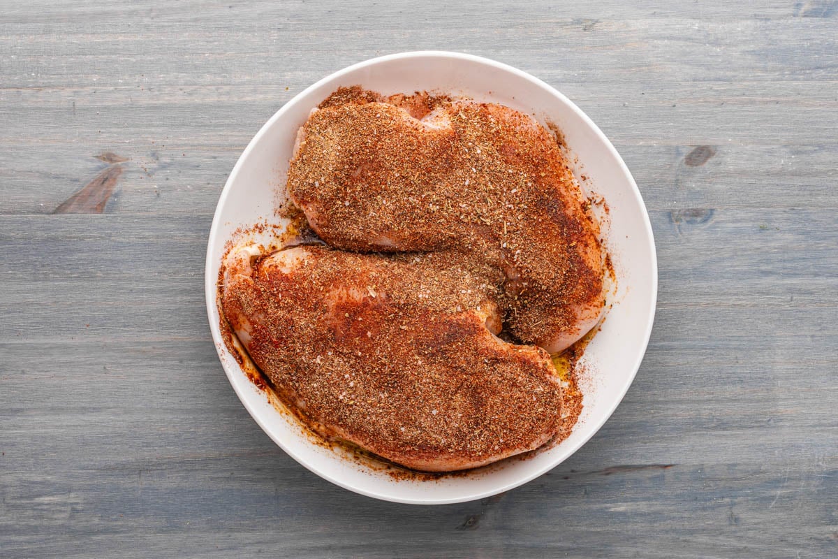 seasoned chicken breasts on a plate