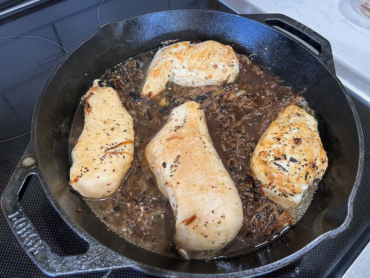 chicken cooking in beef onion broth