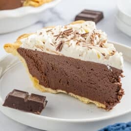 french silk pie sitting on a plate
