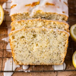 slices of lemon poppy seed bread sliced on a wire rack