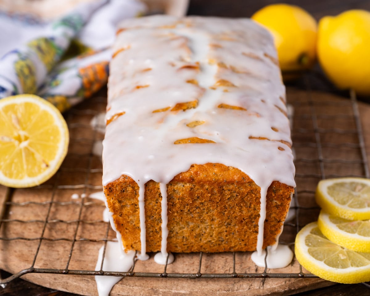 a loaf of glazed lemon bread on a table