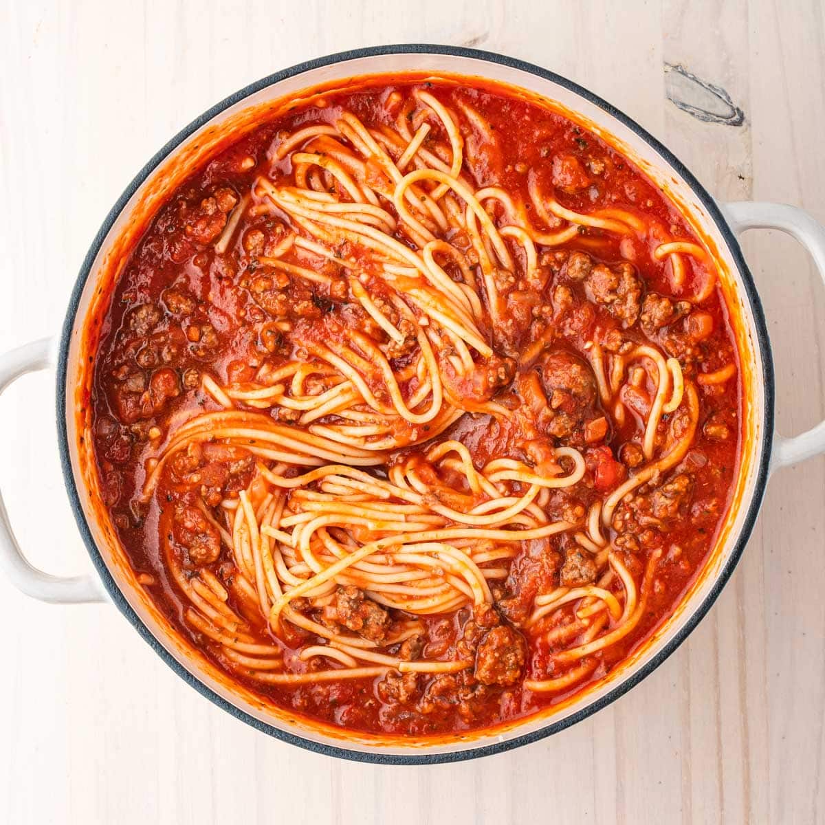 spaghetti with red sauce in a pan