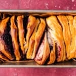 baked pull apart bread with biscuits in a pan