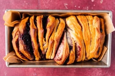 baked pull apart bread with biscuits in a pan