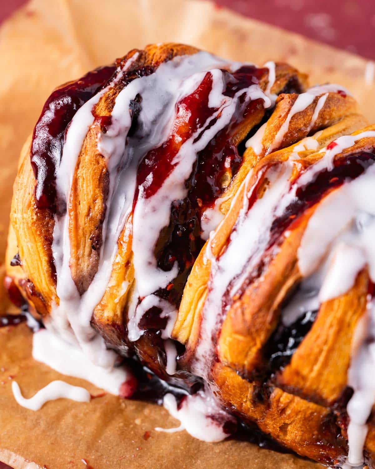 closeup of a loaf of glazed pull apart bread