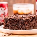 a slice of dr pepper cake on a table