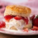 strawberry shortcake biscuit on a plate with ice cream