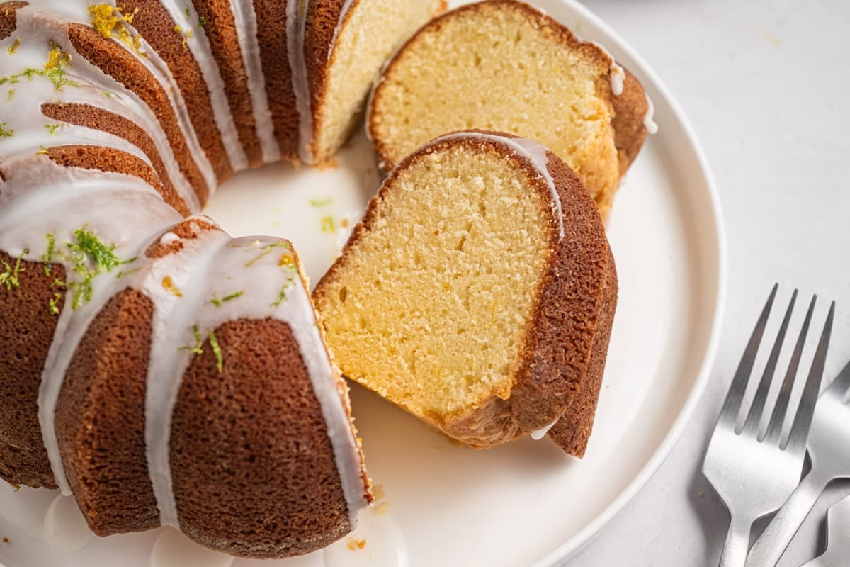 a 7up pound cake sliced on a table with forks