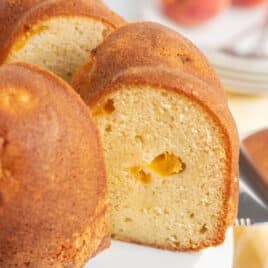 a slice of peach pound cake on a spatula