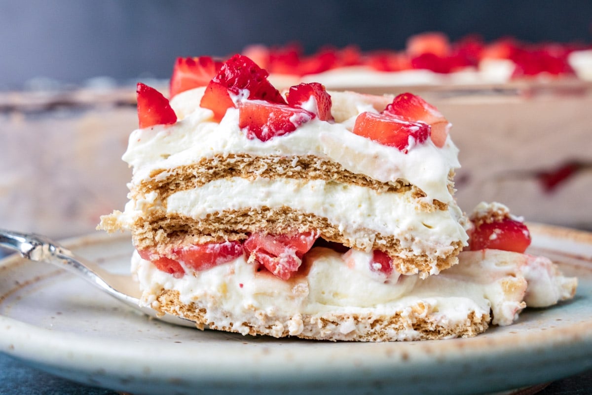 a piece of strawberry banana icebox cake on a plate