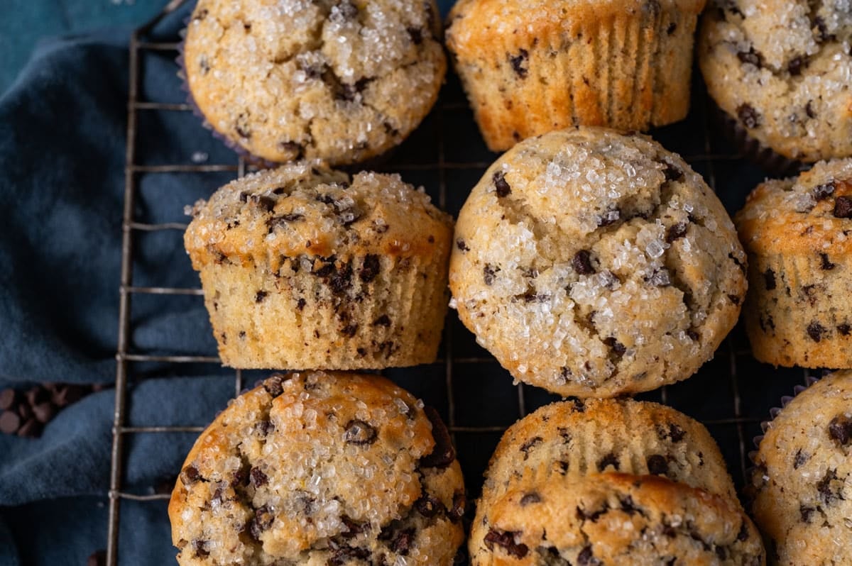 muffins with chocolate chips on a wire rack
