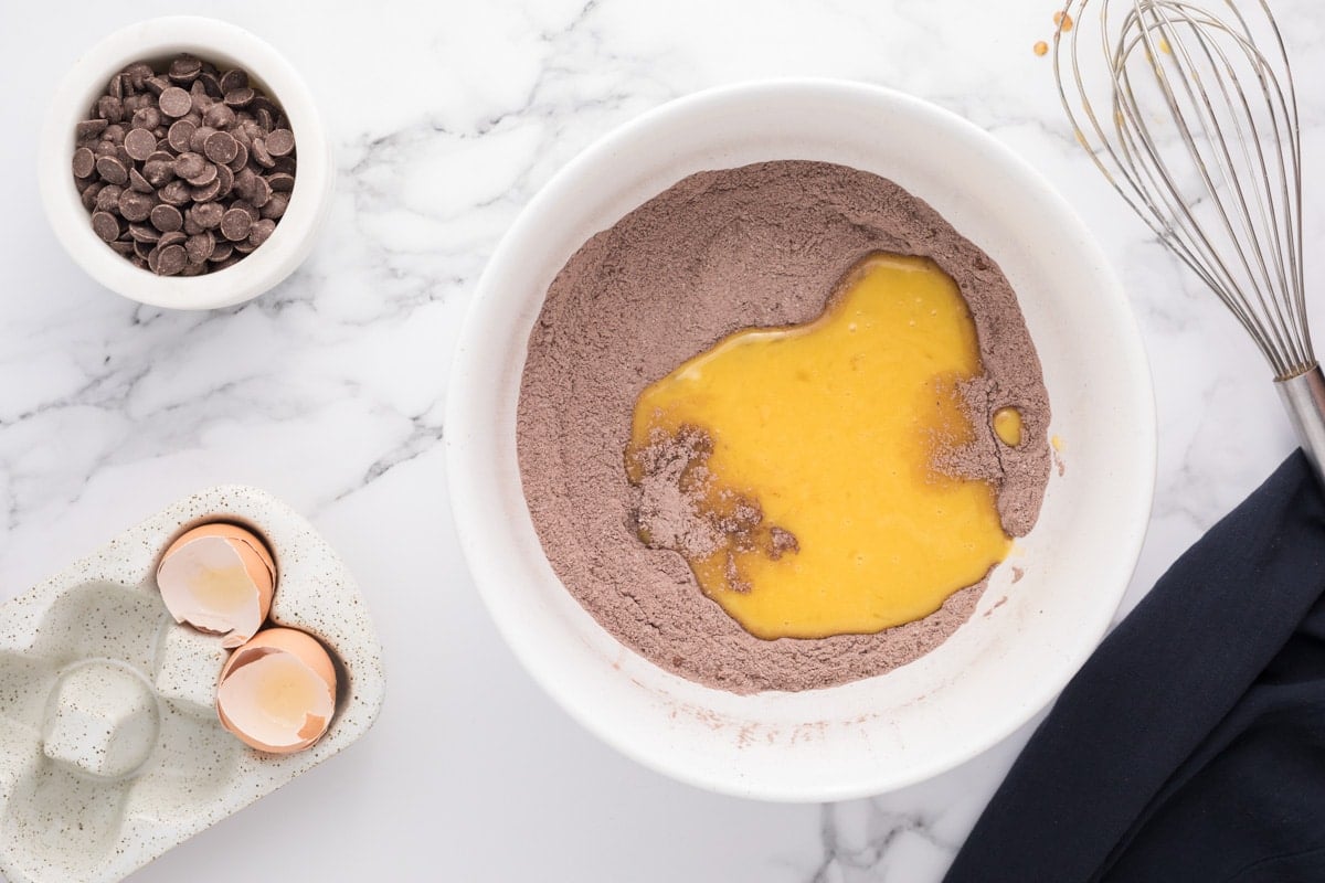 eggs over dry ingredients in a bowl