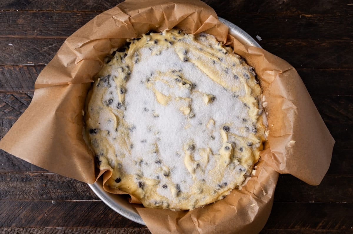 unbaked chocolate chip cake with sugar on top