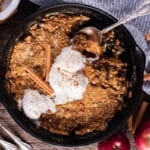 overhead view of a apple crisp on a table