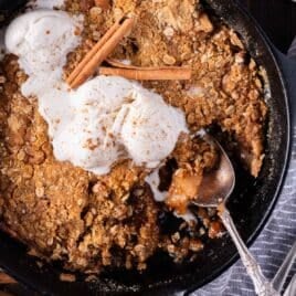 overhead view of apple crisp in a cast iron pan