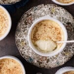 baked custard with creamy texture in a cup with a spoon