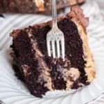 a slice of german chocolate cake with a fork in it