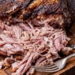 pulled pork on a cutting board