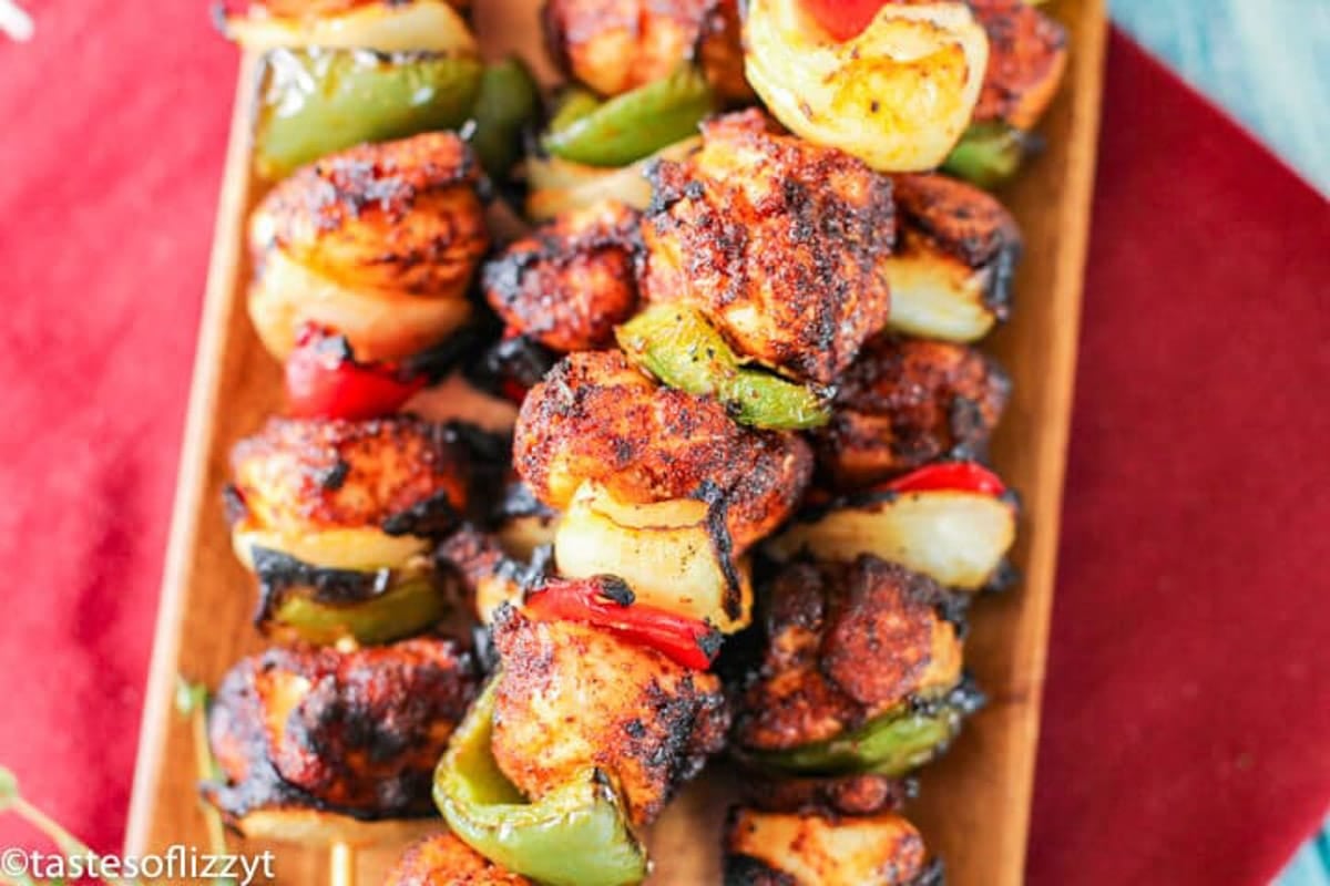 bbq chicken skewers on a tale
