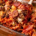 a spoon scooping out a helping of bubble up pizza