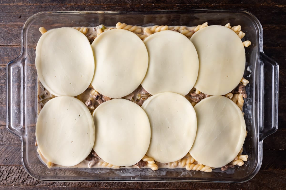 unbaked philly cheesesteak casserole on a table