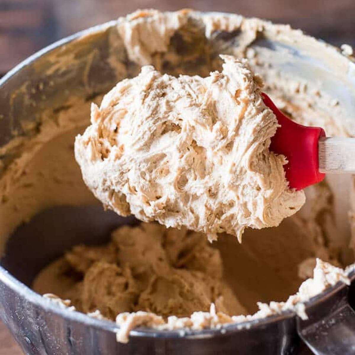 peanut butter frosting on a spatula