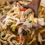 closeup of chicken noodle soup with rotisserie chicken