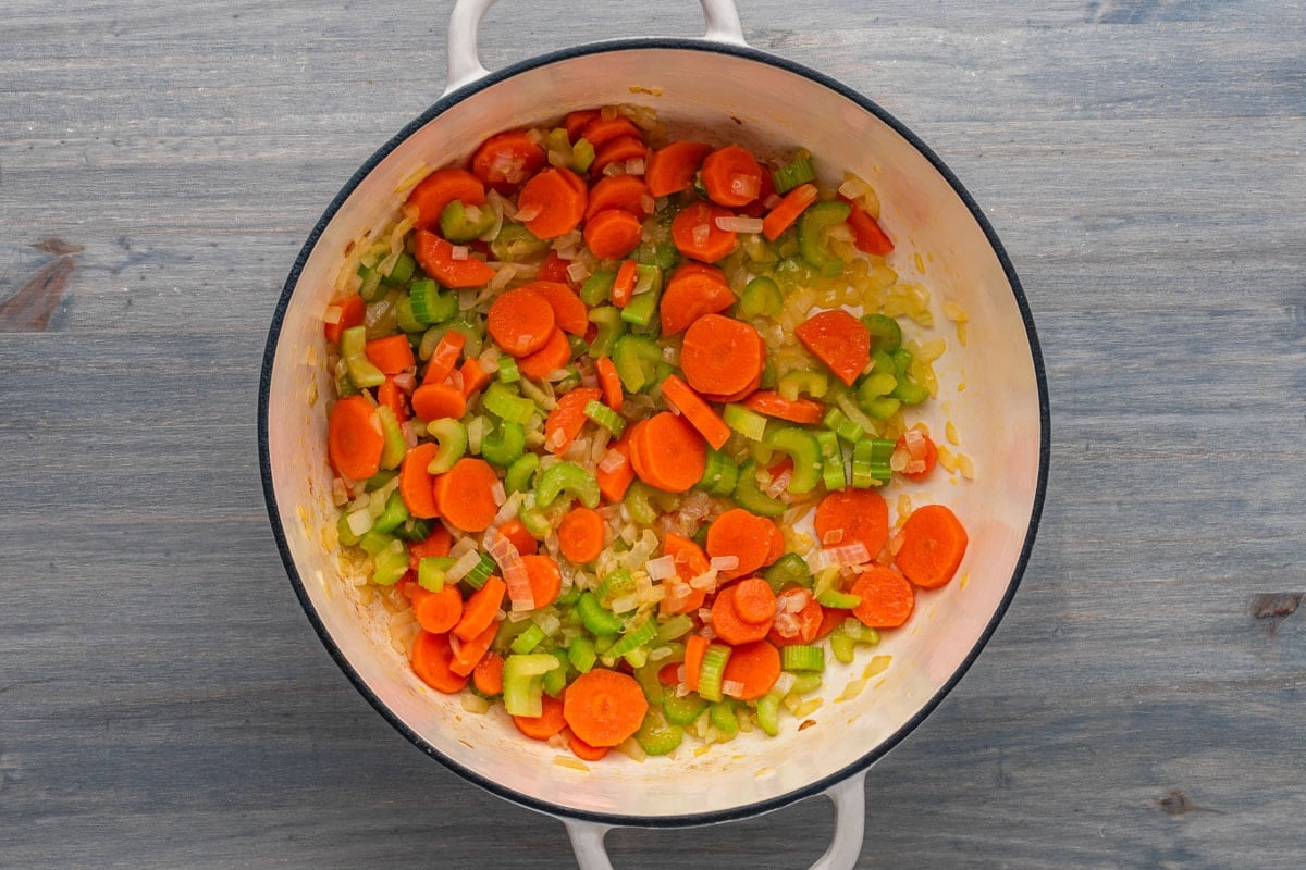 carrots, celery and onion in a dutch oven