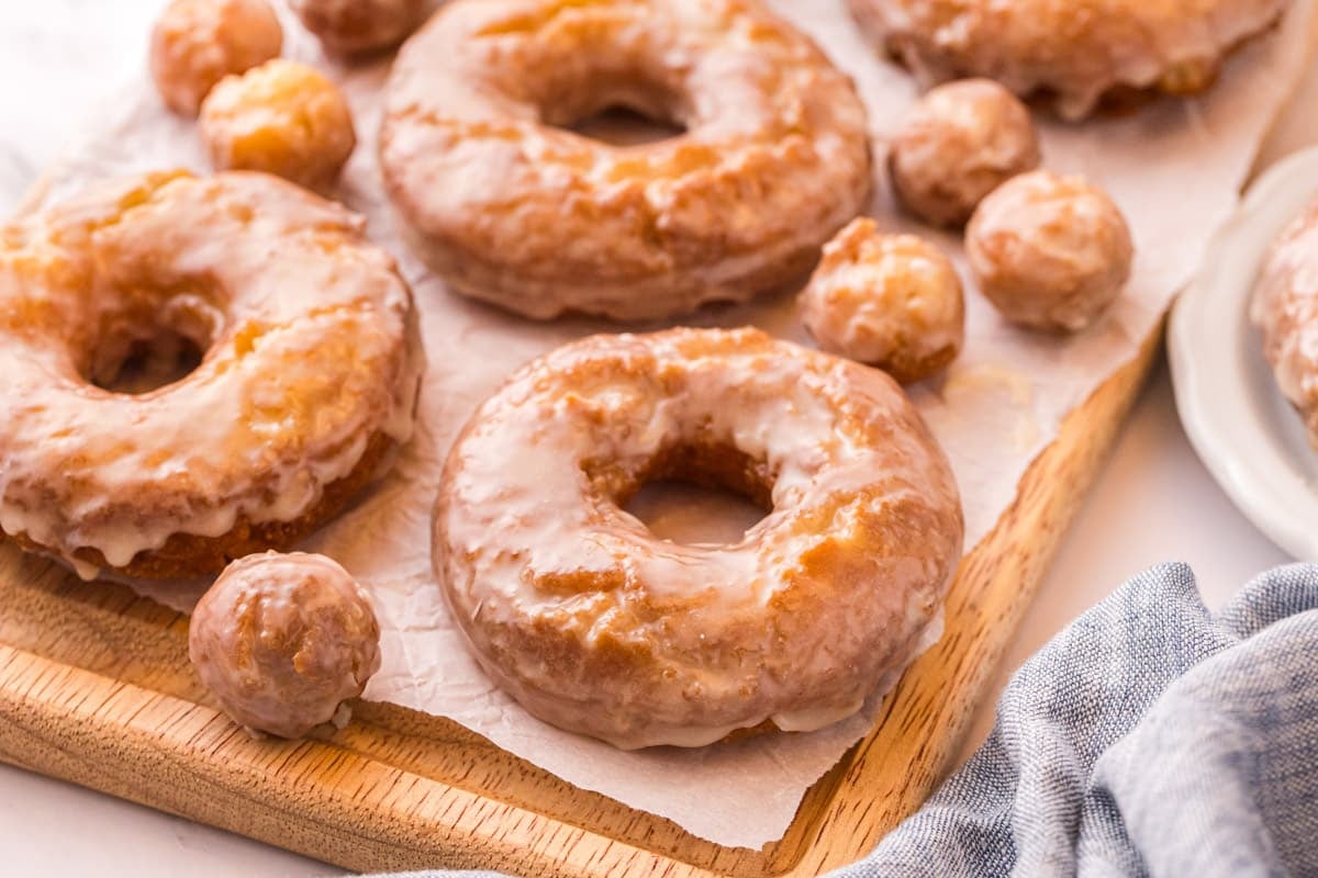 sour cream donuts and donut holes on a table