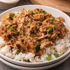 a plate of crockpot chicken teriyaki with rice