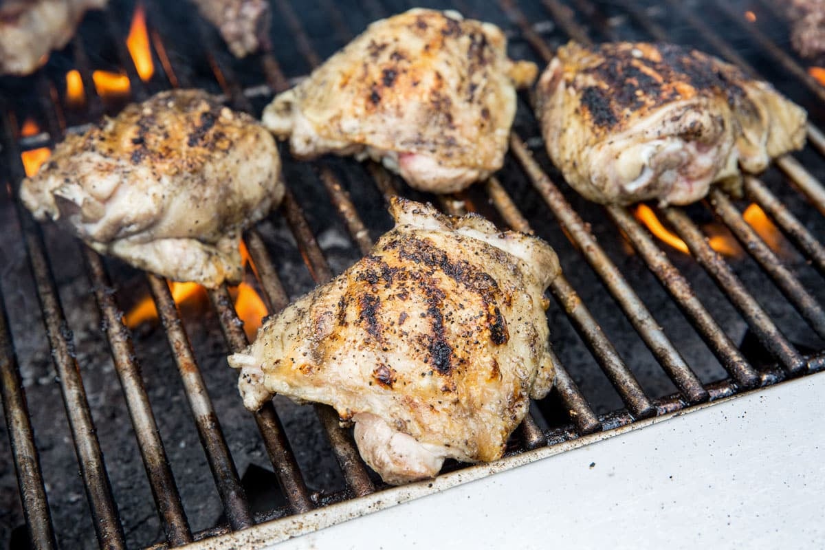 chicken thighs on a grill